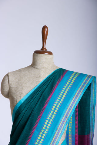 Alikam Khadi cotton plain saree in Midnight Green slub textured weave.