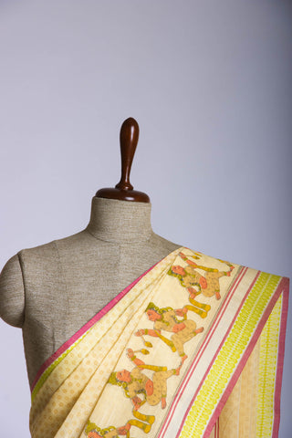 Alikam Khadi-Cotton saree in Buff Yellow and handprint with Thanjavur Figures.