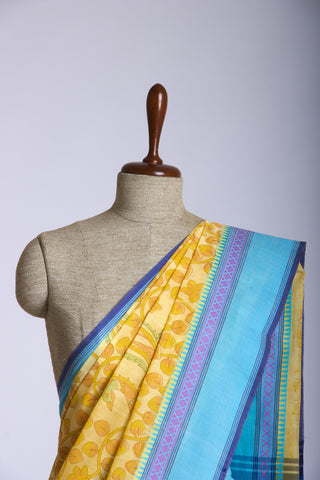 Gadwal Cotton saree in Blonde Green with kalamkari floral print.