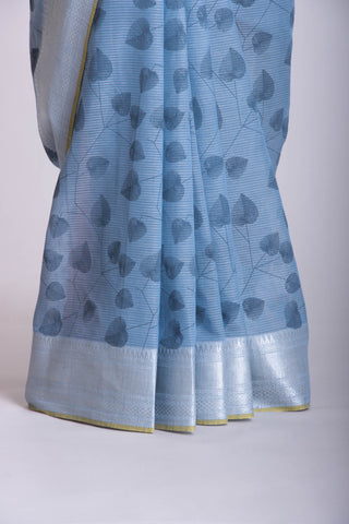 Pale yellow mangalagiri cotton saree with leaves handprint.