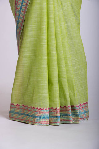 Alikam Khadi Cotton saree  in lime green with white slub texture.