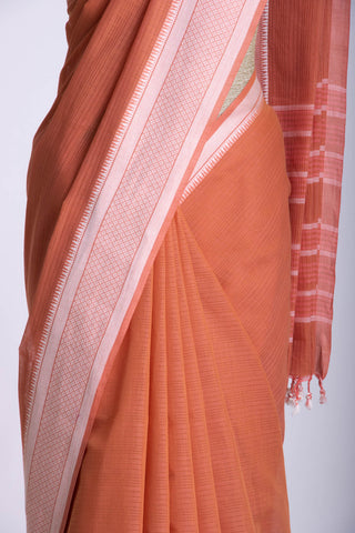 Rust Orange Mangalagiri cotton saree with plain self weave.