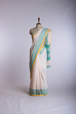 Kanchi Cotton saree  in pale yellow  with simple plain texture.