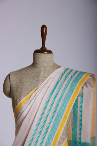 Kanchi Cotton saree  in pale yellow  with simple plain texture.