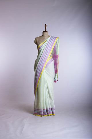 Kanchi Cotton saree  in pale yellow  with simple plain texture.