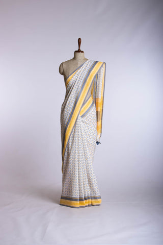 Kanchi Cotton saree  in Off white with geometric pattern hand printed.