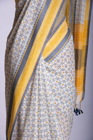 Kanchi Cotton saree  in Off white with geometric pattern hand printed.