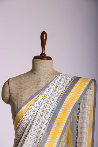 Kanchi Cotton saree  in Off white with geometric pattern hand printed.