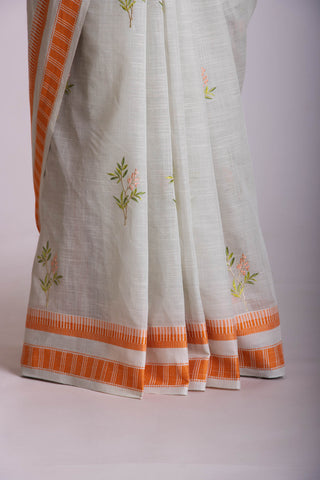 Classic Grey colour khadi cotton saree with hand embroidery motifs.