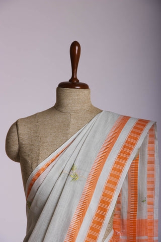 Classic Grey colour khadi cotton saree with hand embroidery motifs.