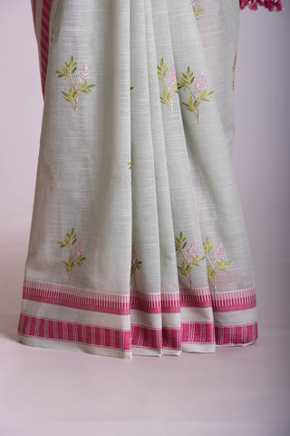 Classic Grey colour khadi cotton saree with hand embroidery motifs.