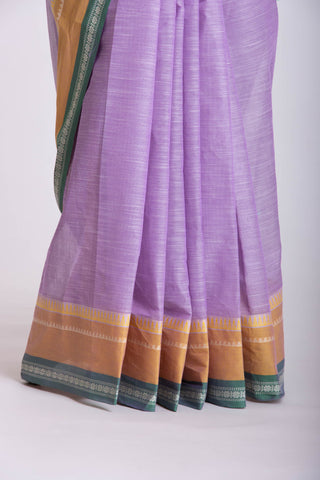 Alikam Khadi cotton plain saree in Lavender and white slub texture.