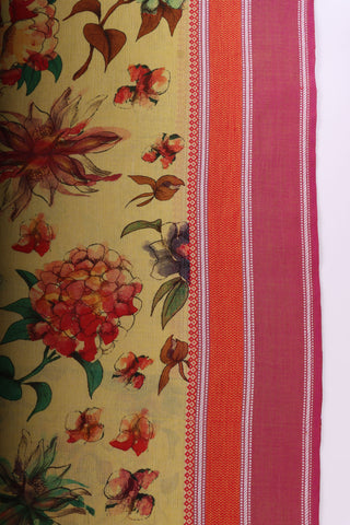 Chettinadu cotton saree in golden Yellow with floral print in the body.