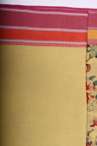 Chettinadu cotton saree in golden Yellow with floral print in the body.