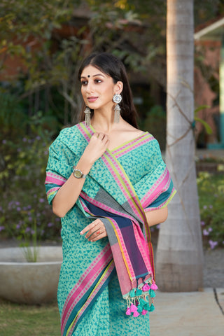 Chettinadu cotton saree in French pink with floral jaal handprint.