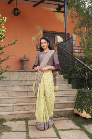 Chettinadu cotton saree in Pumpkin Orange with floral print in the body