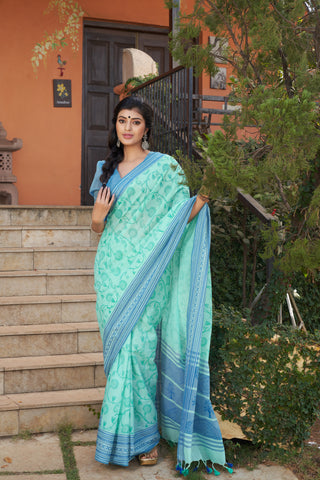 Chettinadu cotton saree in Pumpkin Orange with floral print in the body