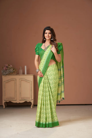 Kollam Cotton saree with lime green hand printed with Bandhani patterned design.