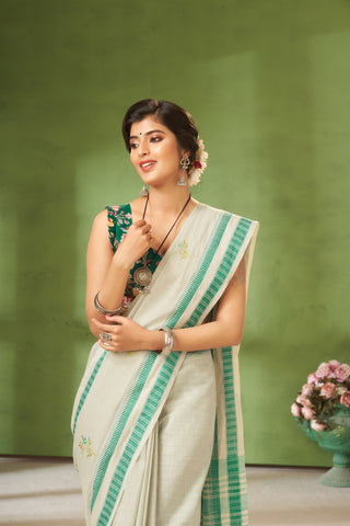 Classic Grey colour khadi cotton saree with hand embroidery motifs.