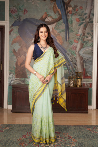 Alikam Khadi cotton saree in baby blue with lotus buds design hand embroidered.