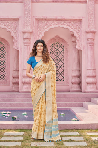 Pale yellow mangalagiri cotton saree with leaves handprint.