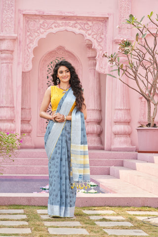 Pale yellow mangalagiri cotton saree with leaves handprint.