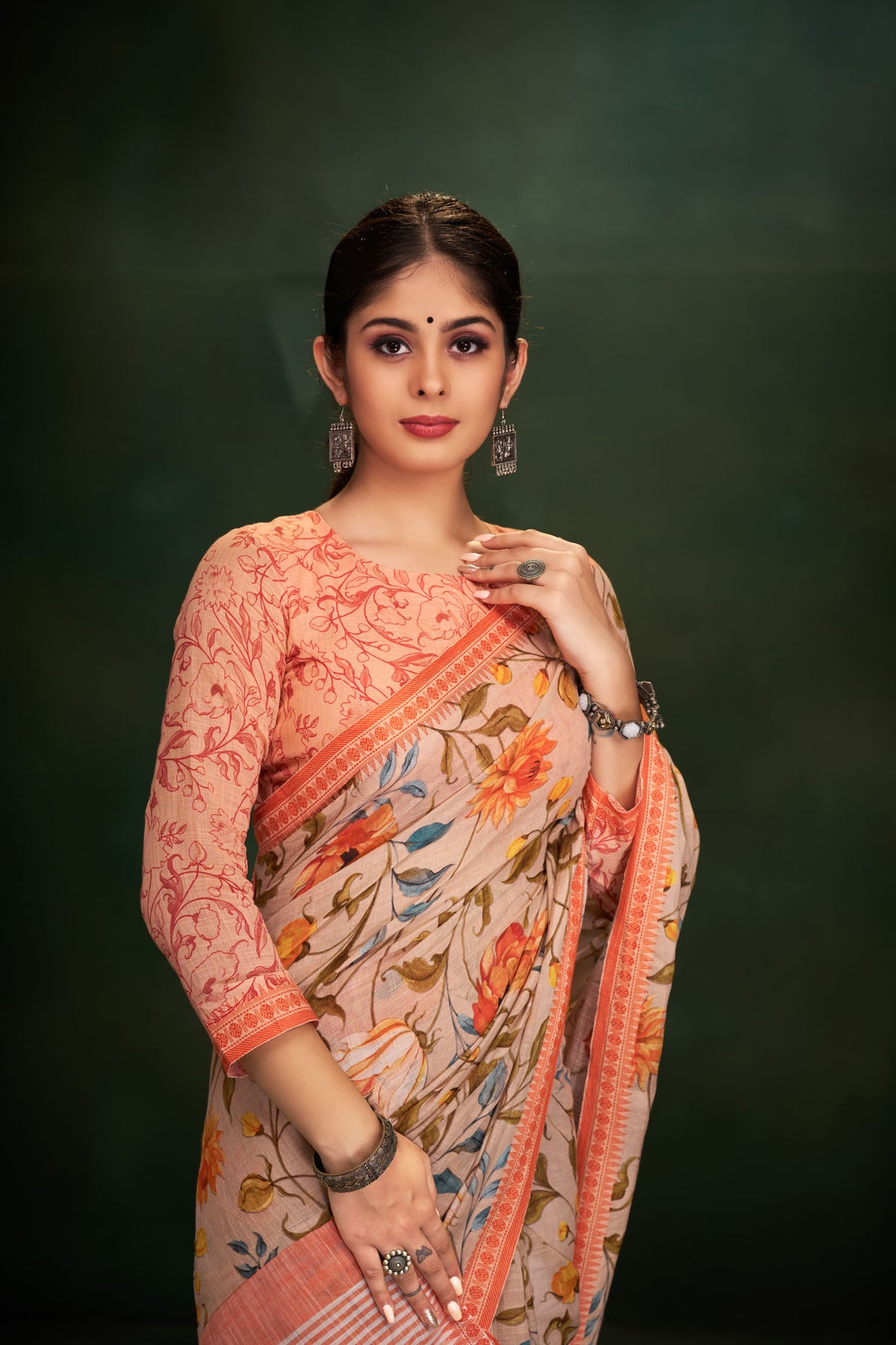 Alikam Khadi-Cotton saree in peach and handprint with floral jaal pattern.