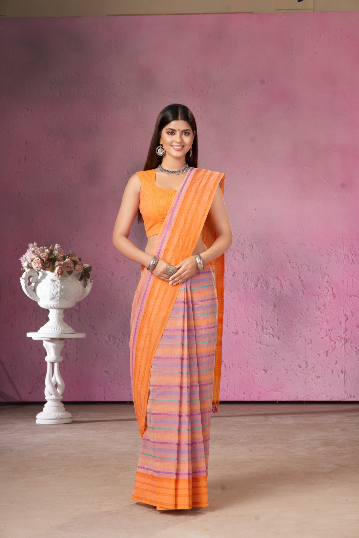 Chettinadu Cotton saree  in shades of lavender with horizontal stripes.