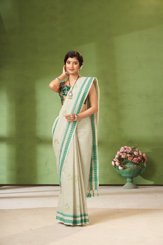 Classic Grey colour khadi cotton saree with hand embroidery motifs.